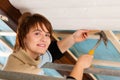 Woman doing dry walling, working Royalty Free Stock Photo