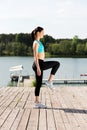 Woman doing excercise in nature.