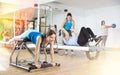 Woman doing exercises on wunda chair in pilates studio Royalty Free Stock Photo