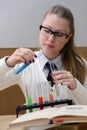 Woman doing experiments in chemistry Royalty Free Stock Photo