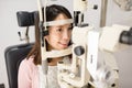 Woman doing eye test Royalty Free Stock Photo