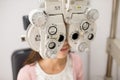 Woman doing eye test Royalty Free Stock Photo