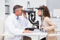 Woman doing eye test with optometrist Royalty Free Stock Photo