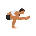 Woman doing Firefly Pose Variation. Practice Tittibhasana Variation.