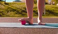 Woman doing foot massage with a ball Royalty Free Stock Photo