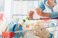 Woman doing grocery shopping Royalty Free Stock Photo