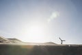 Woman doing handstand in desert Royalty Free Stock Photo