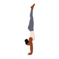 Woman doing Handstand yoga pose. Adho Mukha vrksasana