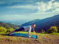 Woman doing Hatha yoga asana plank pose outdoors Royalty Free Stock Photo