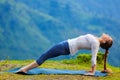 Woman doing Hatha yoga asana Purvottanasana