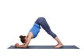 Woman doing Hatha yoga asana Ardha Pincha Mayurasana