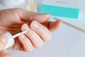 Woman doing manicure, applying oil on cuticles Royalty Free Stock Photo