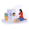 Woman doing laundry putting dirty clothes on washing machine from basket. Vector illustration cartoon style. Royalty Free Stock Photo