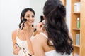 Woman doing make up Royalty Free Stock Photo