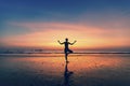 Woman doing meditation near the ocean. Royalty Free Stock Photo