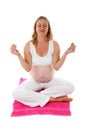 Woman doing meditative pregnancy yoga Royalty Free Stock Photo