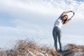 Woman doing the moon pose