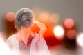 Woman doing a mud mask on her face with a scoop Royalty Free Stock Photo