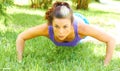Woman Doing Push Ups In Park Royalty Free Stock Photo