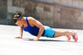 Woman doing pushups outdoor. Royalty Free Stock Photo