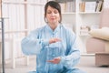 Woman doing qi gong tai chi exercise