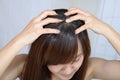 Woman doing scalp massage