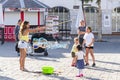 Woman doing soap bubbles Casemates Square Gibraltar Royalty Free Stock Photo