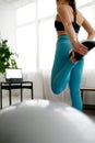 Woman doing stretching exercise, online training Royalty Free Stock Photo