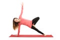 Woman doing tree pose variation