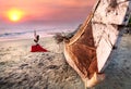 Woman doing virabhadrasana warrior yoga pose