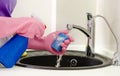 Woman doing the washing up Royalty Free Stock Photo