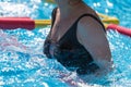 Woman Doing Water Aerobics Outdoor in a Swimming Pool Royalty Free Stock Photo