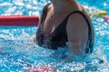 Woman Doing Water Aerobics Outdoor in a Swimming Pool Royalty Free Stock Photo