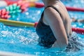 Woman Doing Water Aerobics Outdoor in a Swimming Pool Royalty Free Stock Photo