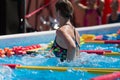 Woman Doing Water Aerobics Outdoor in a Swimming Pool Royalty Free Stock Photo