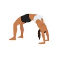 Woman doing wheel pose urdhva dhanurasana exercise