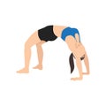 Woman doing wheel pose urdhva dhanurasana exercise.