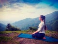 Woman doing Yoga asana Virasana Hero pose Royalty Free Stock Photo