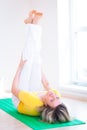 Woman doing YOGA exercise at home Royalty Free Stock Photo