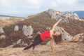 Woman doing yoga in mountains landscape Royalty Free Stock Photo