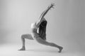 Woman doing a Yoga pose. black and white photo