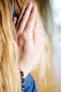 Woman doing yoga in reverse prayer pose at home Royalty Free Stock Photo