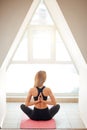 woman doing yoga in reverse prayer pose. Pashchima Namaskarasana Royalty Free Stock Photo