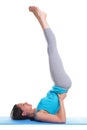 Woman doing yoga shoulder stand Royalty Free Stock Photo