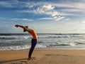 Woman doing yoga Sun salutation Surya Namaskar