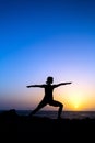 Woman doing yoga sunset silhouette Royalty Free Stock Photo