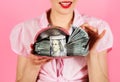 Woman with dollar banknotes on serving tray. Credit. Taxes. Money. Cash. Loan payment.