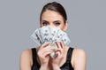 Woman with dollars in hand. Portrait woman holding money banknotes. Girl holding cash money in dollar banknotes. Woman Royalty Free Stock Photo