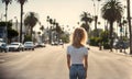 Woman down the 60s California street in vintage vibes