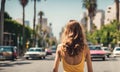 Woman down the 60s California street in vintage vibes